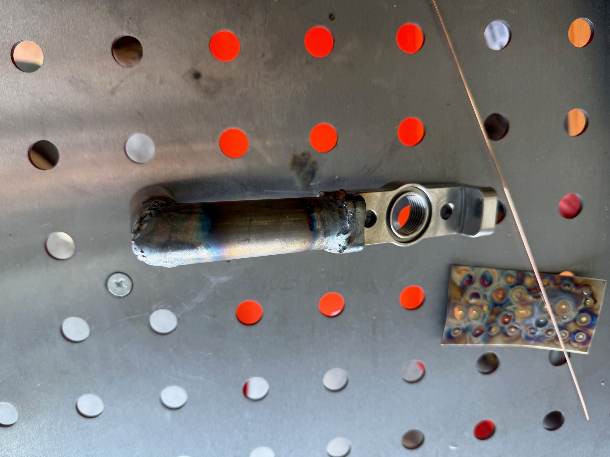 After days of trail and error and blowing off all of my anger I finally was able to lay down some beads. I'm getting the hang of it now. I bought some practice metal to practice on.