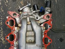 Intake manifold with thin layer of gasket maker.