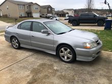 Also has the factory lip kit and full black interior.