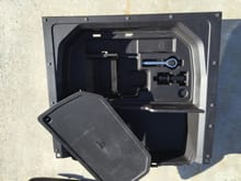 Box with storage increases Cu In. to 14.3 from 13.2 according to Acura Specs.  Includes tow ring and gas funnel.