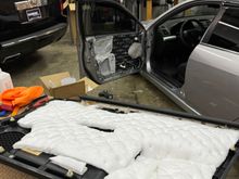Full sound treatment in each door followed by a layer of the ssquilt by metra/balistic to help cut down on some reflection inside the door panel.