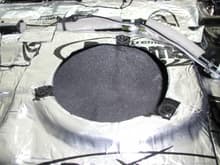 Rear deck speaker hole with deadening and ensolite
