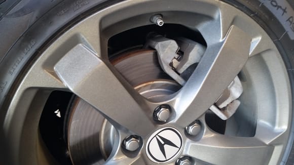 up close how the dirty caliper looked after doing fresh refinish on wheels....
