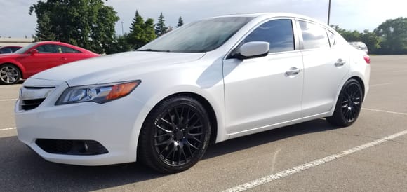 17x8 40mm offset with 235/45/17 tires

Lowered on Tein S-Tech springs