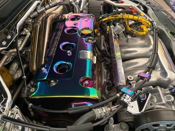 Neo chrome valve cover, oil cap, and coil pack cover. (Not eBay)