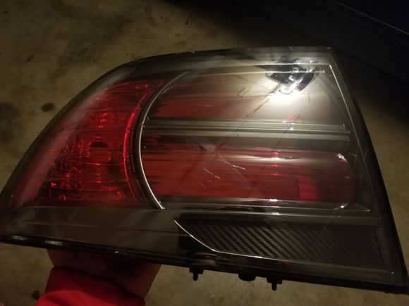 Modded oem type s left tail light, small stress cracks inside the lens, common in modded lights 