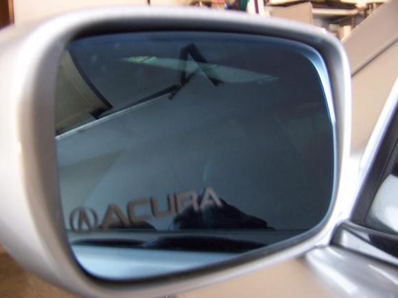 ACURA badged side view mirror logo.