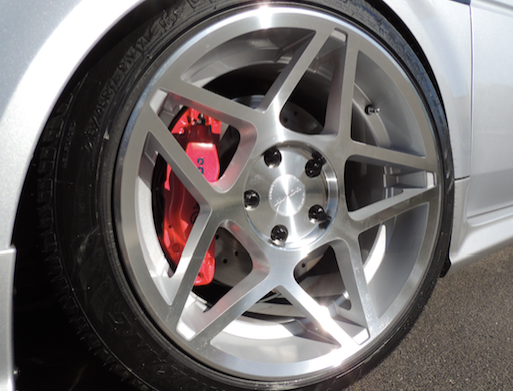 Brembo and metallic clear coat on the calipers.