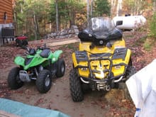 Dad and Daughter's side by side.  (Both are now sold, and replaced with an '09  Can-Am 650 Outlander Max XT, and an Arctic Cat AC 150 - pictures to follow.)