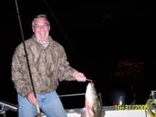 My Dad and a nice striped bass (Rockfish) caught on light tackle. That smile is worth a lifetime of boat payments.                                                                                      