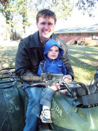 This is me and my nephew Ethan.  I took him on his first quad ride over the 2004 Christmas holidays.                                                                                                    