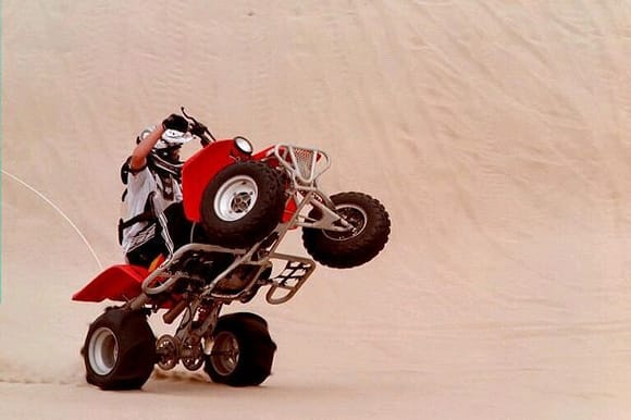 Another wheelie pic(this is also going around a dune just dosn't look like it)
