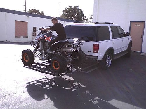 Yep, this is my son on my DS720 setting on top of a Joe Hauler Quad Carrier, with a few extra modification. This carrier works well. my bike ways 600  lbs and I drive up it all the time, and I myself way 340lbs you do the math. I always get a lot of looks. See you at Venice Beach this summer 2010.
