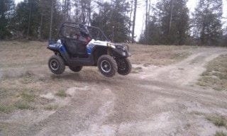 Yes, this is a 995 pound RZR with all four tires off the ground.  Roadie cleared 40  feet on another jump.