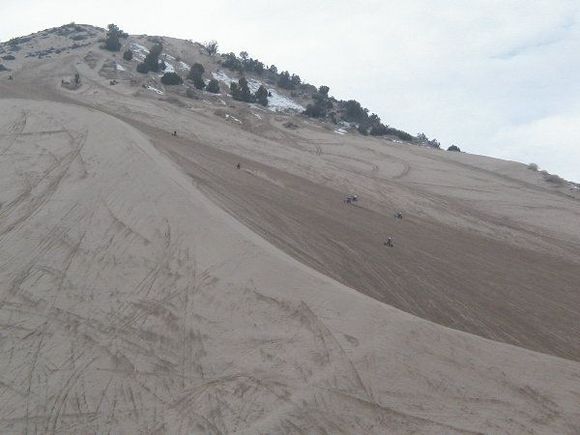 This is at Sand Mtn. Utah. The face is on the left and the valley in on the right. Takes some serious horsepower to top these hills with speed.                                                         
