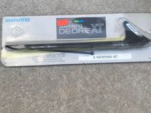 Probably the coolest ATB accessory of all time ever - a Shimano Shark Fin from about 1988 to protect against chain slap and chain sucking between the tire and chainstay. 