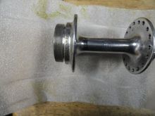 The contents:  A Record hub shell with damage to the drive side flange.  I'm not sure if the out of spec flange shows well in this picture.