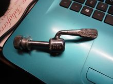 This very cool Campagnolo seat post quick release that adds even more weight to the build while he is not noticing.  