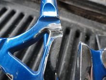 I used a wire Dremel bit to remove the paint for the weld area.  Two stage paint application with white on the bottom.