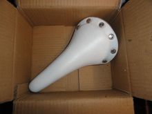 Closest fit I found for a box unless I rob a new saddle of it's packaging.  There is room for some small bits, or "borked" parts from the BOC.  You know the stuff pantographed Cinelli  kickstands, and other useless items.