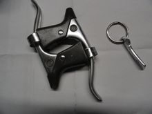 Levers ready for cover install.   Left shifter lever after lots of work to save enough for the keychain fob.    