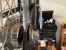 I  can't get the item seated in the frame.  On either side the threaded part grinds into the axle cover.  I'm ready to toss it and let the axle rest in the bottom of the two frame halves.   Is something missing?  Something must be since I can't get it to work.  

kevino