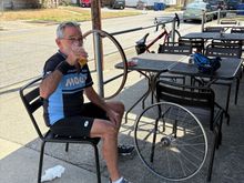 Was just leaving this cafe after a beer stop but had to return after a few pedal strokes with a rear flat.  Ordered another beer for the job, and it was on the house when the keg blew.  This is my favorite flat changing situation.  No hurries or worries.
By