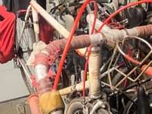 Under the top tube is the worst spot. The rust build-up got pretty thick in spots. No holes though.