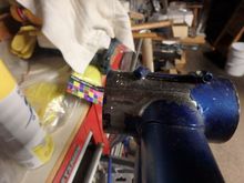 Chrome bottom bracket under the chipped blue paint.