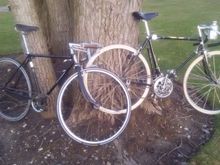 66 Schwinn Racer fixed gear and 57 JC Higgins 2x3x3 both bikes riding on 700c