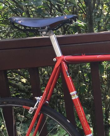 The other is moving to a newtome vintage bike.  Natural leather color.
