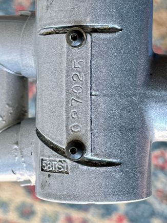Serial number 027025, lines up with 1982. The 
58TSI refers to the angle between the seat tube and down tube (58 degrees) and Tim S. Isaacs, who designed the shell...