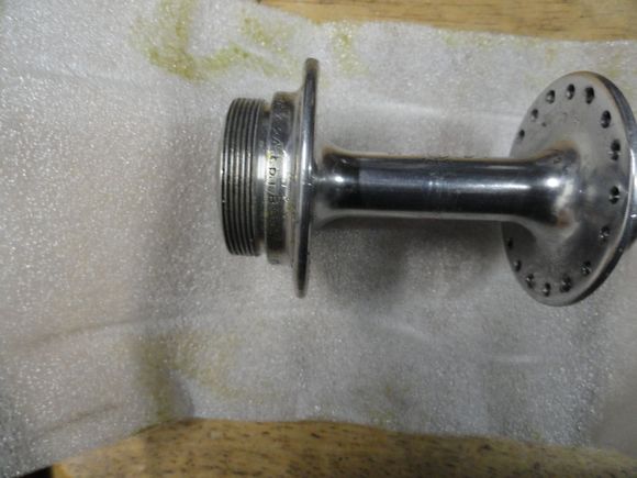 The contents:  A Record hub shell with damage to the drive side flange.  I'm not sure if the out of spec flange shows well in this picture.