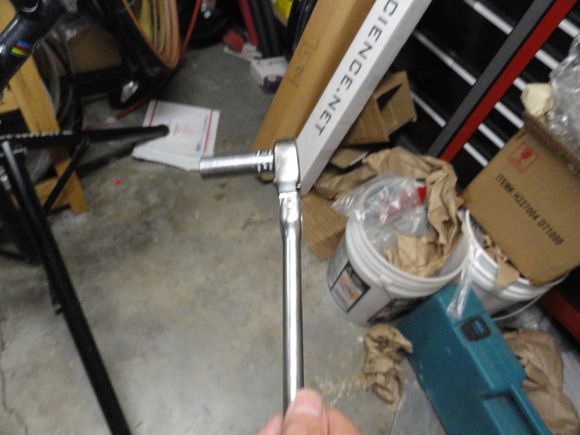 Mac tools ratchet with a long handle for plenty of torque and a six point socket.  I use an 8 grade bolt with new washers for the spindle assembly.