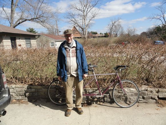 Rob and his new to him tandem.  I think he is smiling a bit.