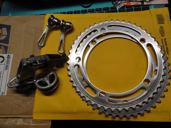 The RD came in from Alan with the fixing bolt still attached.  The shift levers will likely go on a future build for me.  And the rings from Rob are destined for a half step gearing set on perhaps the Trek and maybe the Basso.