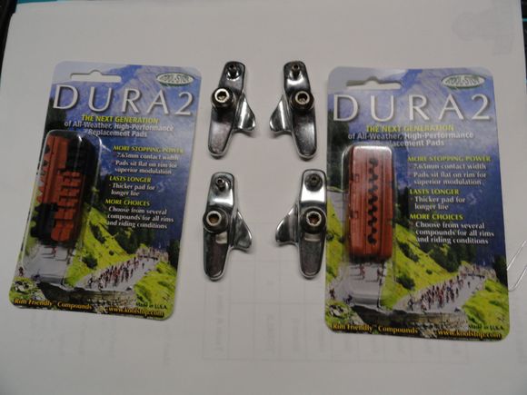 Two pairs of brake block holders and the KS pads for them.