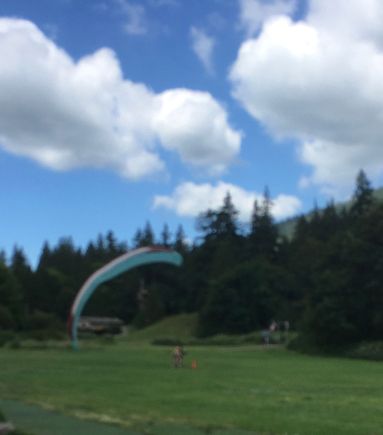 Feet on the ground, the chute coming down gently, too.