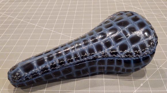 The 'Gatorcet (Avocet Racer recovered in alligator embossed cowhide). Available for any poor soul to test ride at his or her own discomfort! Please note: The stitching disappears under the booty. Other factors caused my pain and suffering!