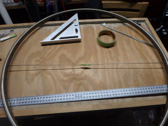 Two spokes taped together and measured after removal.