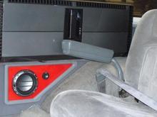 2 T40001BD amps (one on each side) and custom rear speaker location.