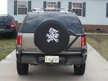 Here's a shot of the custom spare cover my wife made for me