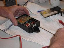 KE Module prying circuit board attachment from the case