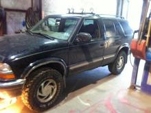 torsion bars turned up and had new leaf springs made for the rear, then put 31 inch mud terrain tires on