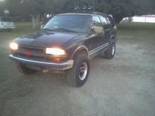 T bar crank only. 6 inch lift soon to come. Rims are 15x8s not sure about backspacing
