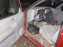 as usual, the driver's seat is totally crapped out, so the other guy just put in a plain cloth seat.