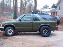 new tires and painting my wheels now waiting on lift to get here
