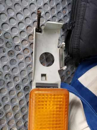 The parking lamp assembly with the fog light removed.