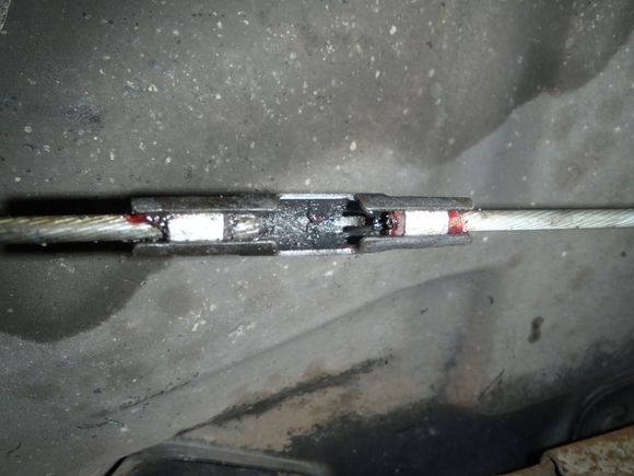 Rear brake cable attached to connector