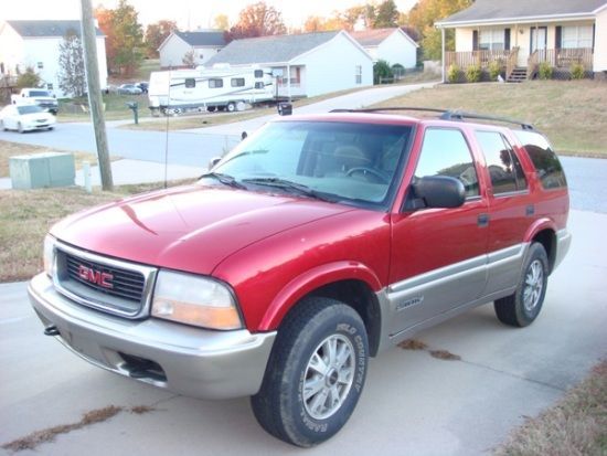 Stock, in the driveway.